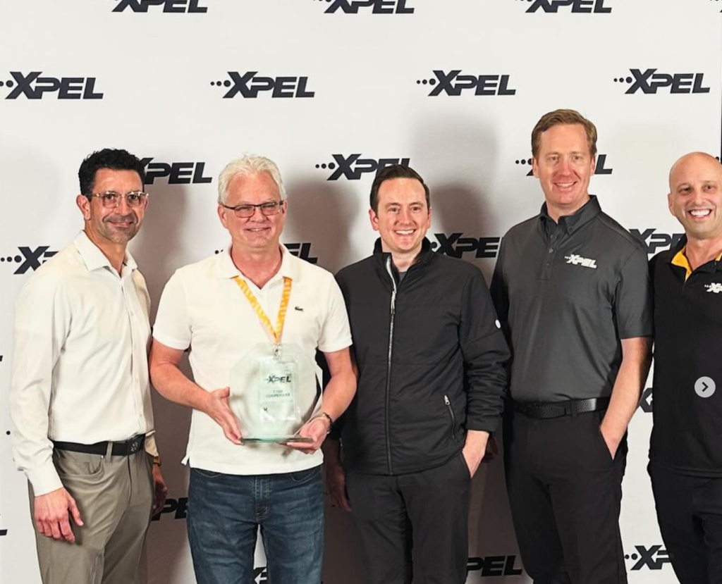 ESOTERIC receiving the XPEL dealer of the year award